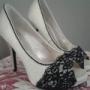 white stillotte encrusted with black lace