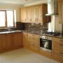 Kitchen with tiling in Bray