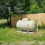 Calor Ireland - outdoor gas tank in backyard of the house