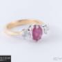 Uploaded by visitor on 05/02/2018 - Three stone gold engagement ring set with diamonds and a ruby.