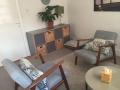 What is the role of the therapist in Psychotherapy