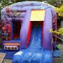 Action Hero Theme Bouncy Castle with Slide