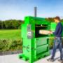loading cardboard into 100 baler