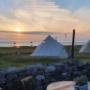 You will be mesmerised by the tranquility and exclusivity of our glamping site, as it hosts only but two rustic bell tents, a BBQ, our provincial stone mermaid bar, and our verdant beer garden.