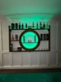 bespoke drinks display bar feature wall with backlit shelving.